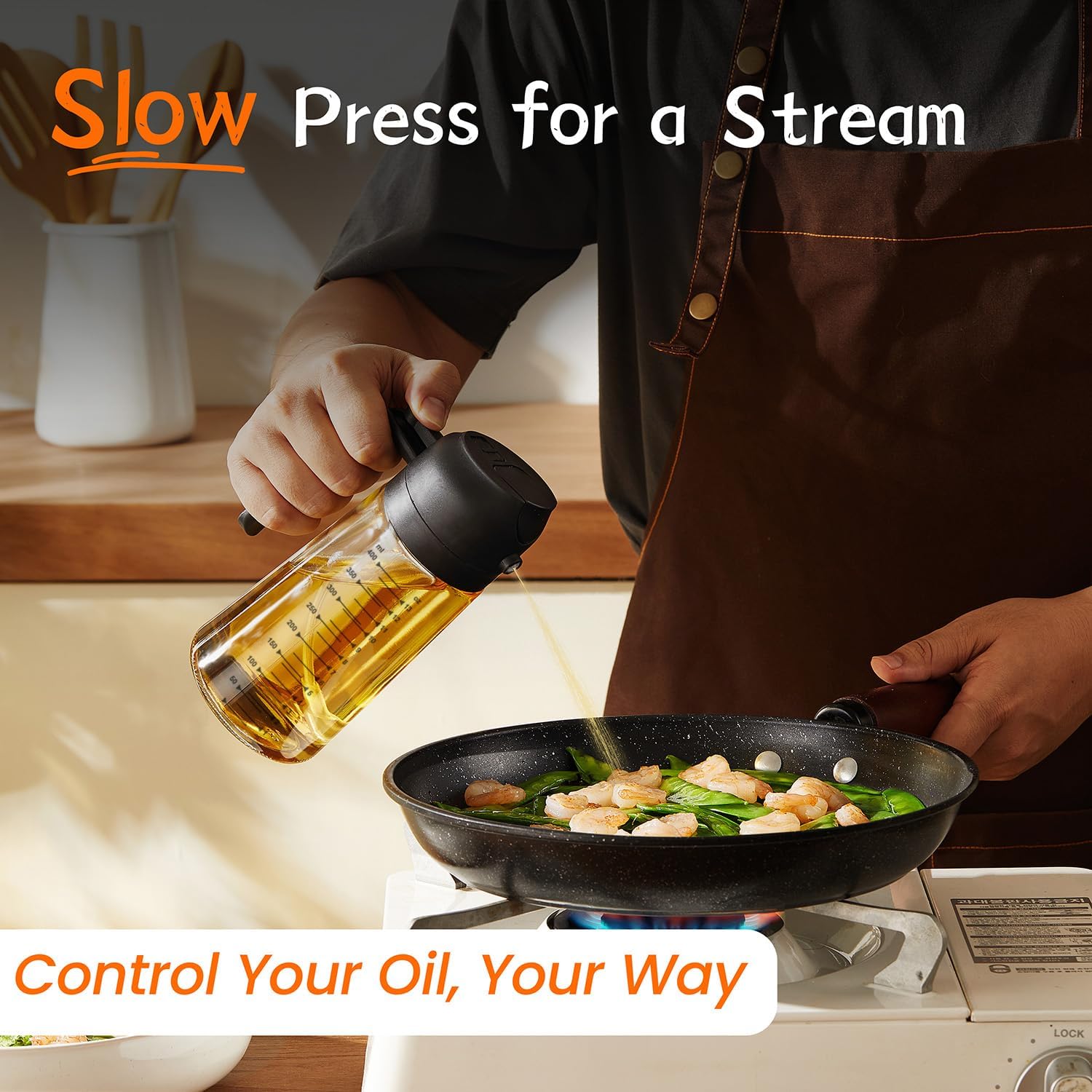 TrendPlain 16oz/470ml Glass Olive Oil Sprayer – 2 in 1 Olive Oil Dispenser Bottle next to air fryer